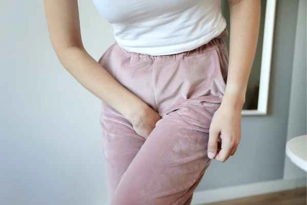 woman struggling with urine incontinence Cardiff