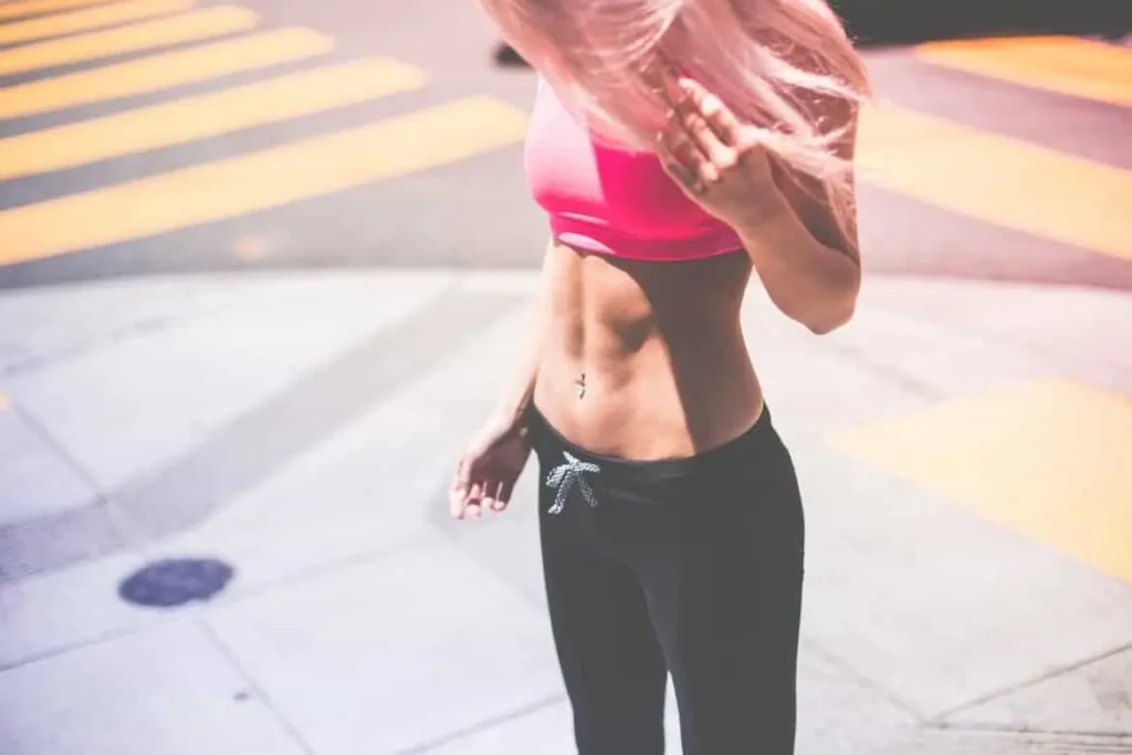 Woman with toned stomach after LA-EMS Body Sculpting Treatment Cardiff
